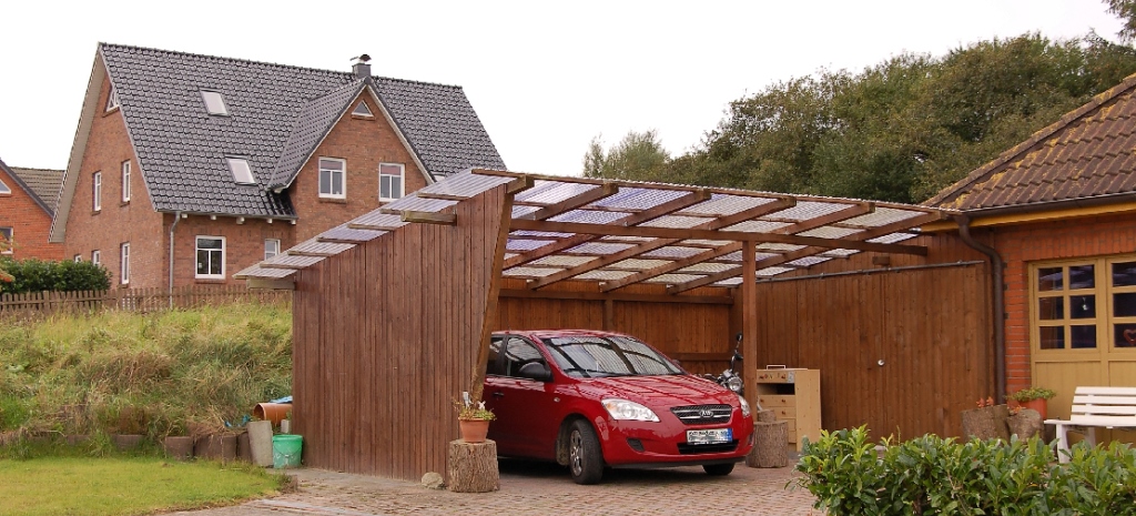 red car in a carport